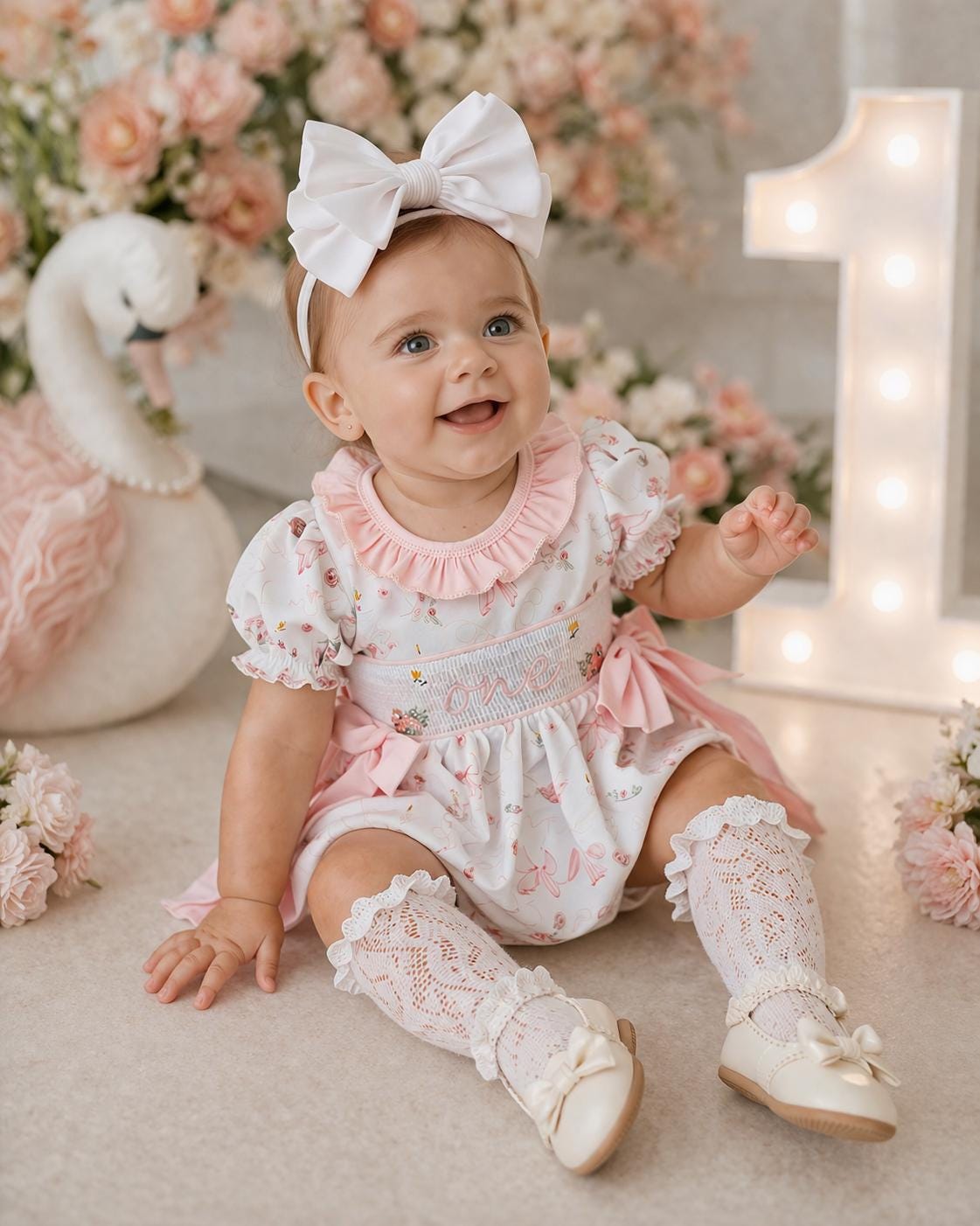 swan princess first birthday outfit bubble romper pink and white floral flowers and bows first birthday girl romper pink and white outfit, girls swans sweet white smocked bubble romper first birthday spring summer bows ruffle embroidered smocked swan 1st birthday outfit romper baby girl cake smash outfit, the mod mango baby boutique co