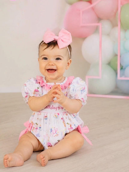 one is fun first birthday outfit, pink first birthday smocked bubble romper outfit its fun to be one pink bow ruffle first birthday girl romper pink and white outfit, colorful rainbow pink white smocked bubble romper first birthday winter bows ruffle bows  embroidered smocked long sleeve 1st birthday outfit romper baby girls, the mod mango baby boutique co