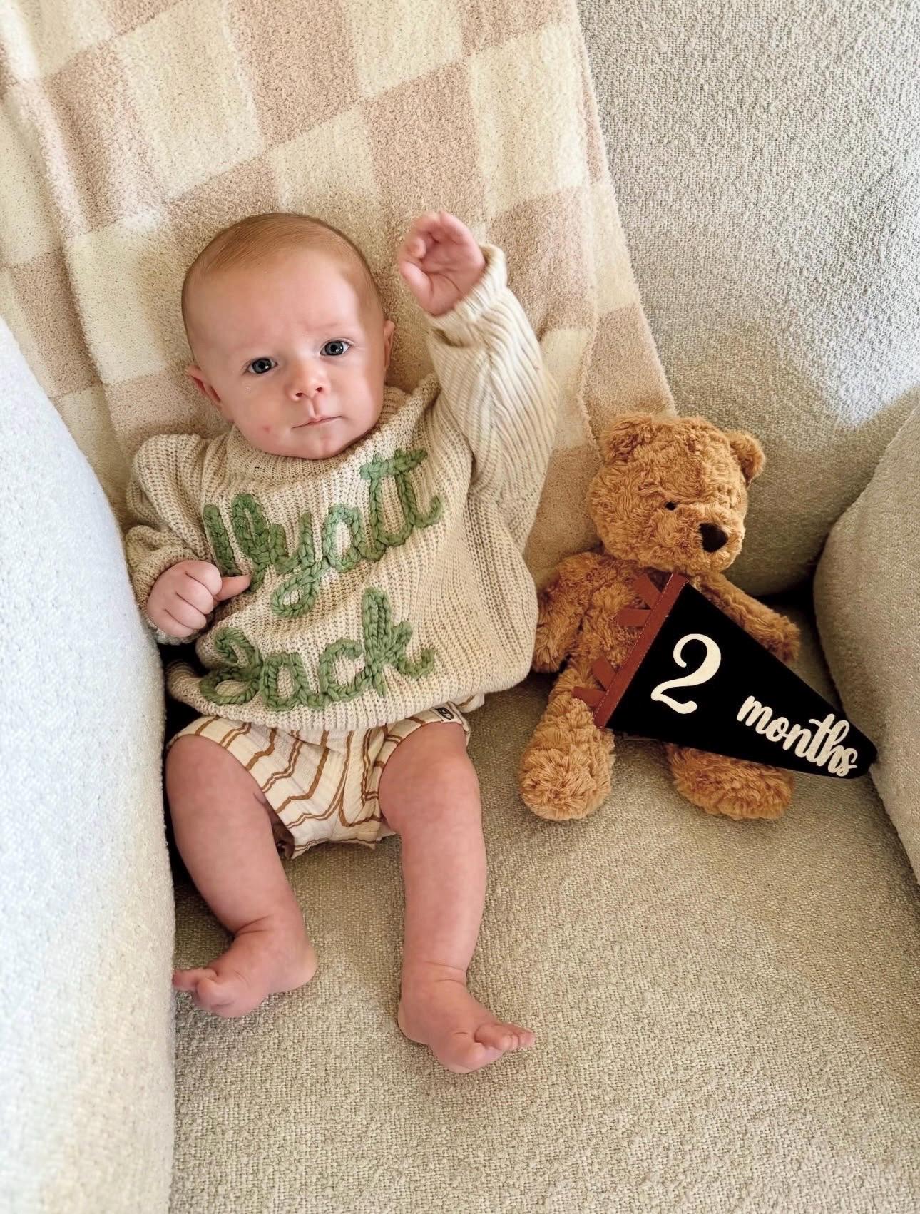 hand embroidered baby toddler brother sweater with flowers for baby boy girl, personalized baby shower gift for girl, light pink blush beige cream baby gift, pregnancy announcement, custom newborn baby sweater with name, hand embroidered baby sweater, the mod mango baby boutique co