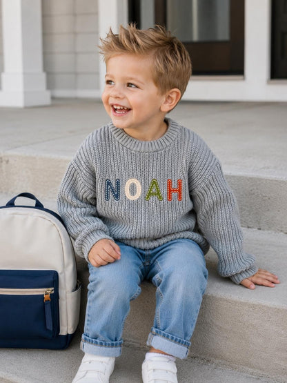 oversized toddler boys sweater embroidered name sweater, personalized back to school shirt, kids preschool kindergarten stitched name, blue white red beige cream mint green brown, fall sweater for kids toddler boys, custom baby sweater with name, embroidered baby sweater, the mod mango baby boutique co