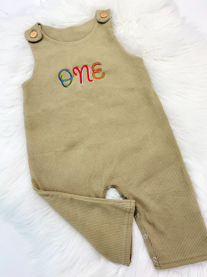 colorful green fun to be one waffle knit baby boys first birthday one romper overalls jon jons olive green, blue, yellow, red, orange, first birthday theme boys romper first birthday overalls outfit one boys first birthday outfit, the mod mango baby boutique co