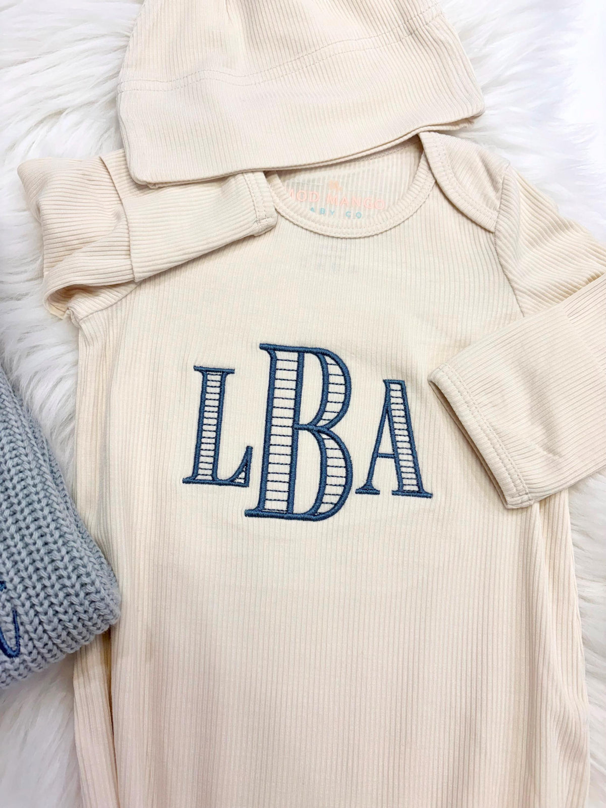 custom monogrammed personalized baby coming home outfit layette set, big sister big brother sweater little sister little brother gown outfit big sister little sister big brother little brother matching set, Baby Toddler Name Sweater, matching siblings hospital outfit, Red and white, tan, beige, blue, mint green, lavender, blush pink, brown, confetti chunky knit personalized sweater shirt outfit, newborn bamboo gown with hat headband and swaddle set, the mod mango baby co, outfit baby toddler