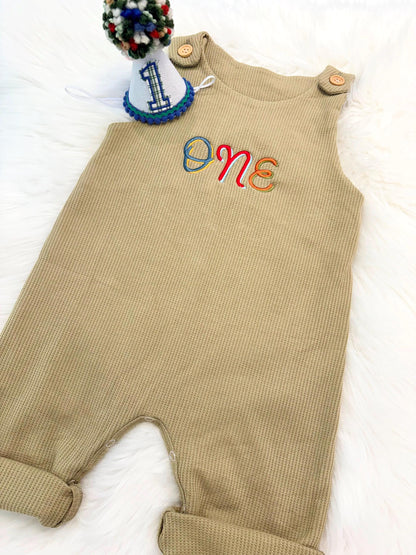 colorful green fun to be one waffle knit baby boys first birthday one romper overalls jon jons olive green, blue, yellow, red, orange, first birthday theme boys romper first birthday overalls outfit one boys first birthday outfit, the mod mango baby boutique co