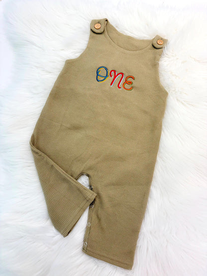 colorful green fun to be one waffle knit baby boys first birthday one romper overalls jon jons olive green, blue, yellow, red, orange, first birthday theme boys romper first birthday overalls outfit one boys first birthday outfit, the mod mango baby boutique co